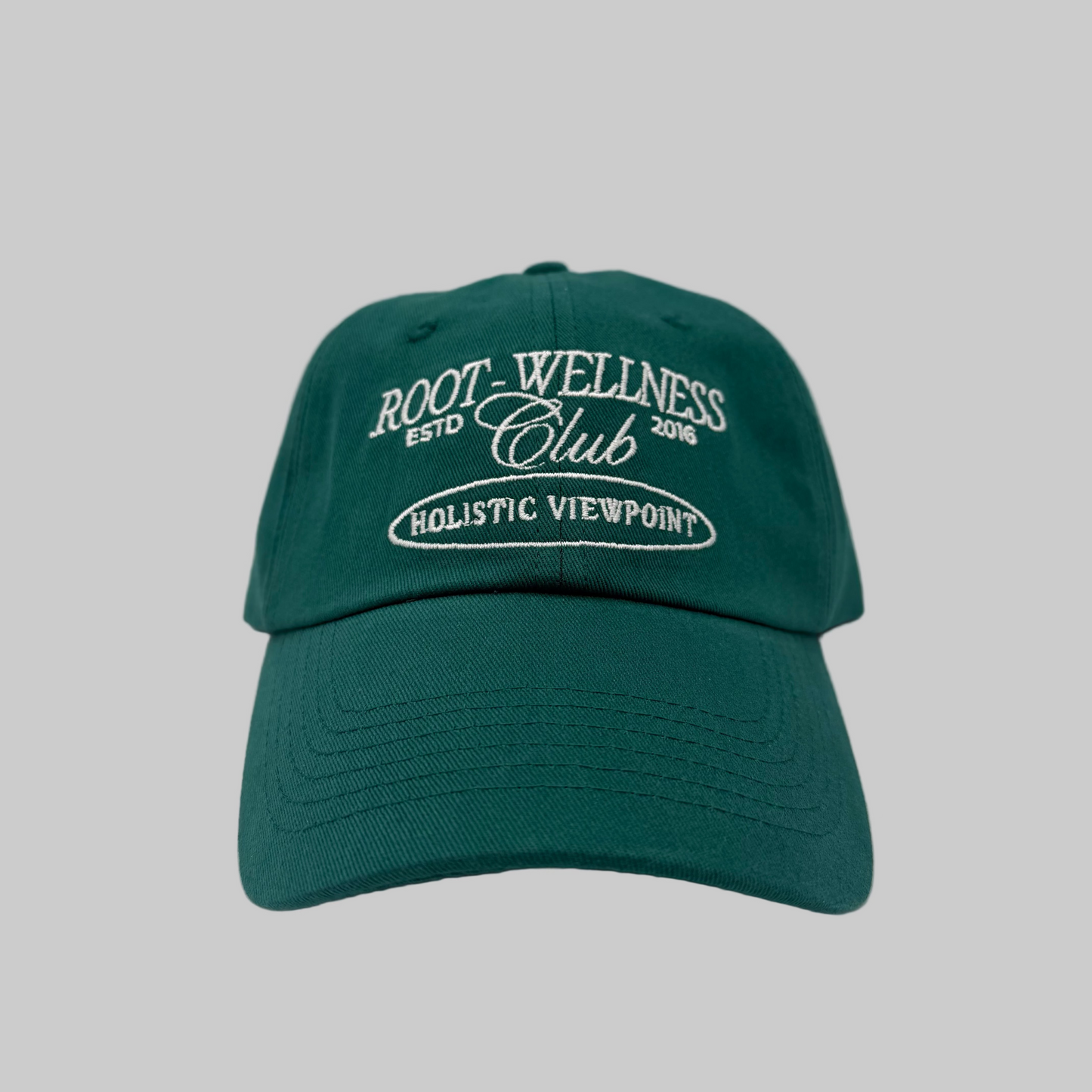 Green cap with white text on a white background