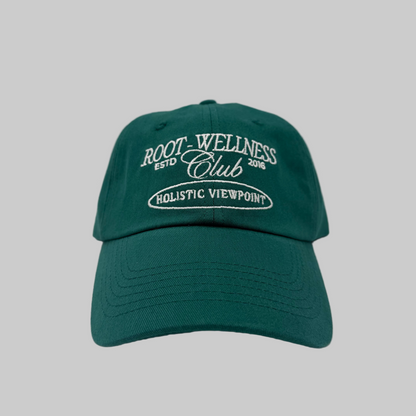 Green cap with white text on a white background